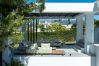 Modern Marbella villa terrace with luxury outdoor lounge