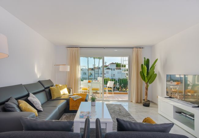 Apartment in Estepona - Beachside Penthouse with Rooftop Terrace & Pool
