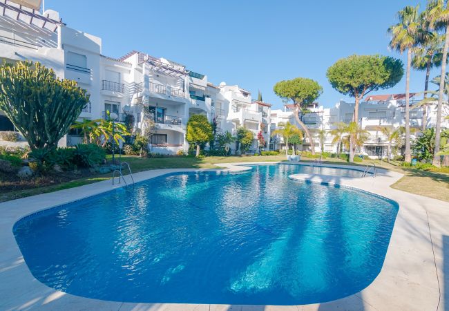 Apartment in Estepona - Beachside Penthouse with Rooftop Terrace & Pool